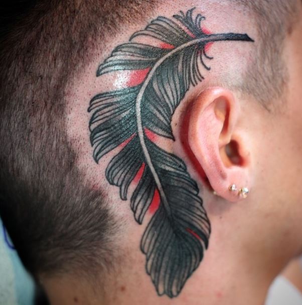 a feather behind the ear  TATTOO ZOO