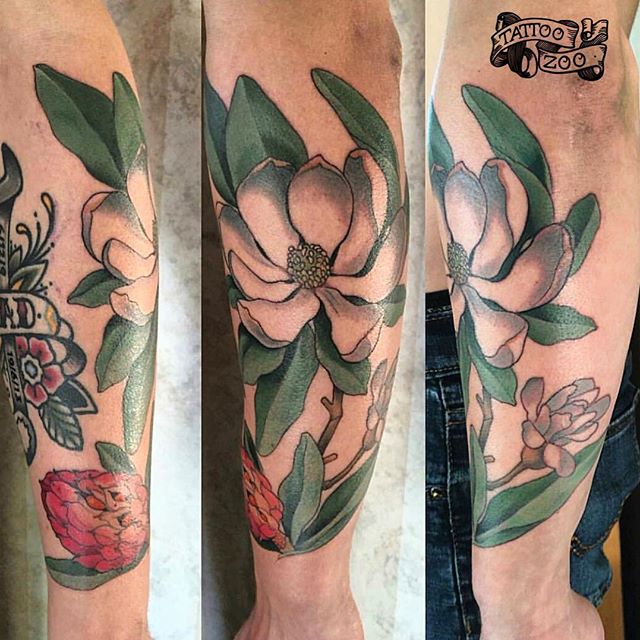 Beautiful magnolia by @davidmaiertattoos Call 250-361-1952 to book.