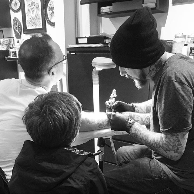 Normally we don't let kids come back into the studio but this young man designed his Dad's tattoo so we let the artist watch his drawing become a tattoo. ❤️ #welovetattooingyou