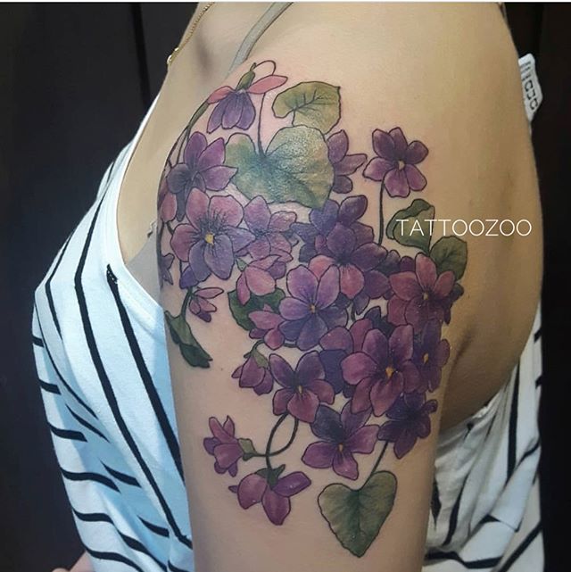 Beautiful violets by @marymadsentattoos Call 250-361-1952 to book your free consultation. #weLOVEtattooingyou